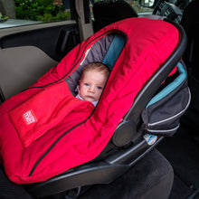 baby parka red car seat cover shown with newborn in car seat in vehicle